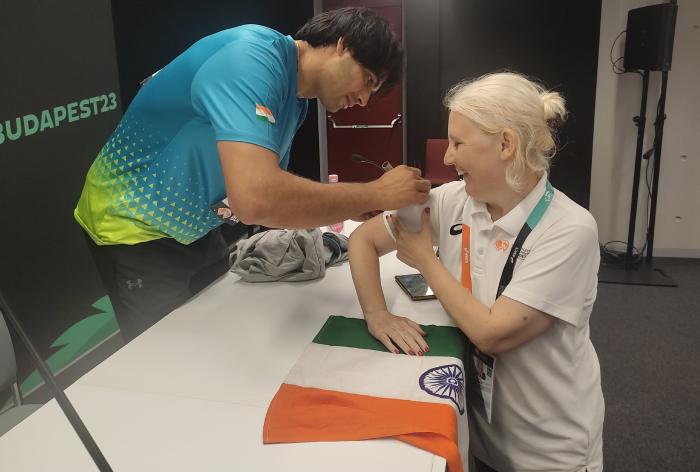 Neeraj-Chopra-Giving-Autograph